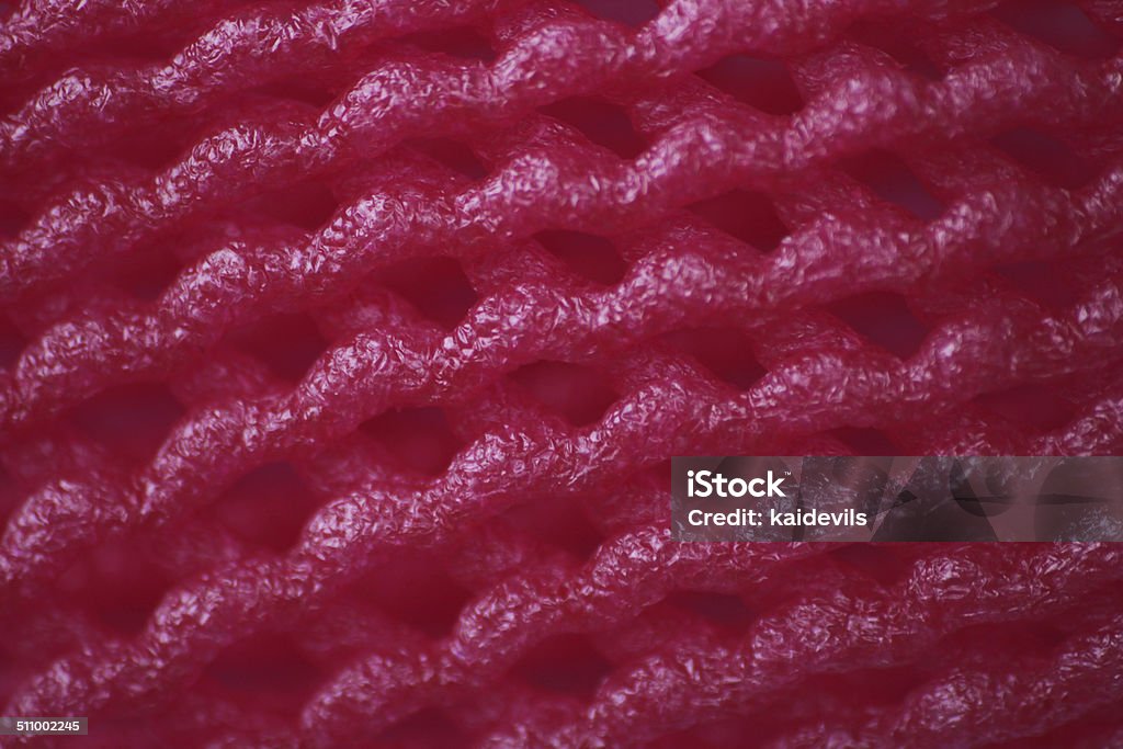 shockproof net foam The pink shockproof net foam use for prevent fruit from bumping. Colliding Stock Photo