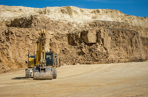 istock Excavator at a quarry site in the uk 511002531