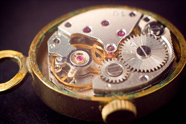istock Analog clock metal mechanism close up 511009426
