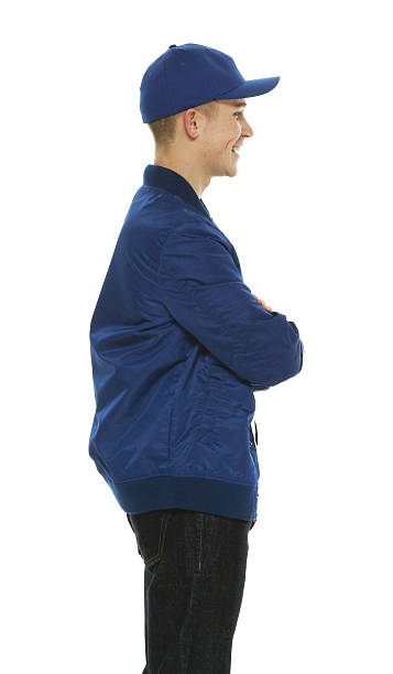 istock Smiling casual man standing with arms crossed 511010824