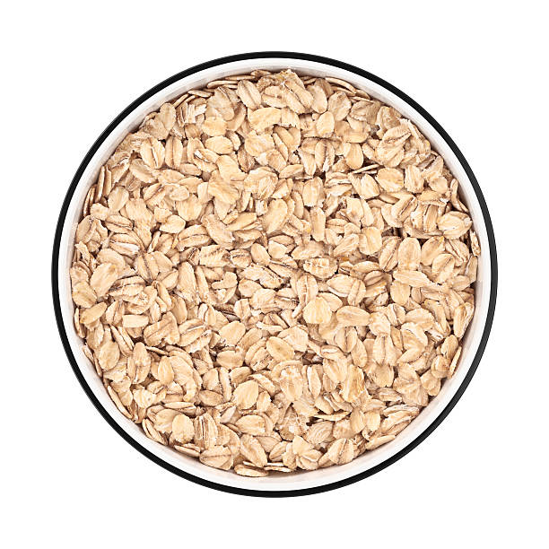 istock Oat flakes in a bowl from directly above 511012192