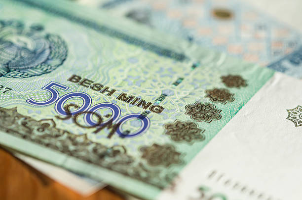 istock Banknote of five thousand Uzbekistan sums close up 511012356