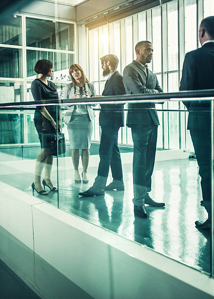 istock Business people discussing at the lobby 511015732