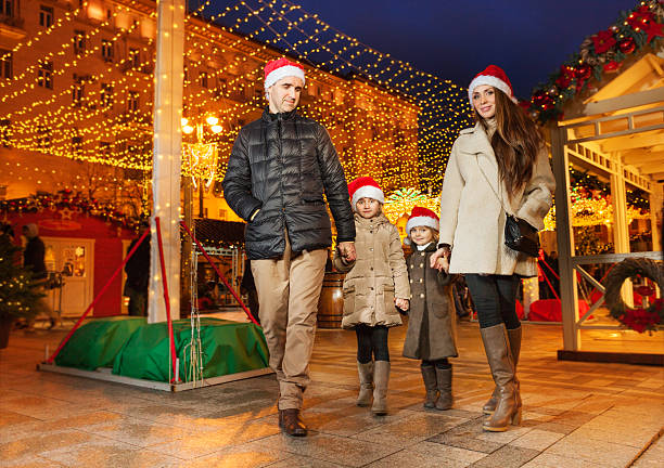 istock Happy family with two daughters at the city park 511016444
