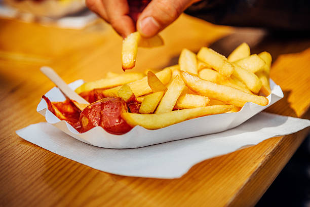 istock German Currywurst with french fries 511018412