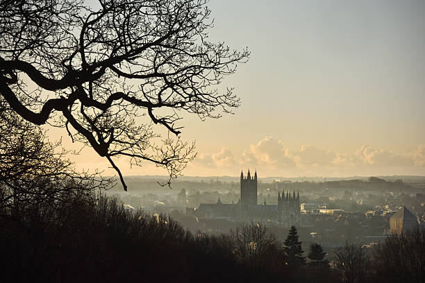 Canterbury dawn A frosty dawn over the English city of Canterbury with ancient gothic Cathedral in semi silhouette canterbury england photos stock pictures, royalty-free photos & images