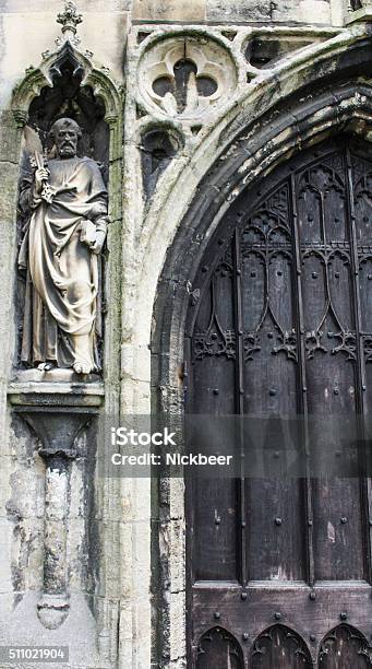 Church Entrance Showing Large Wall Mounted Sculpture Stock Photo - Download Image Now