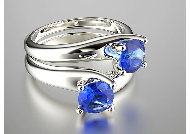 istock Engagement Ring with sapphire. Jewelry background 511023449
