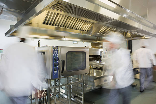 istock Team of chefs working in a commercial kitchen 511024749