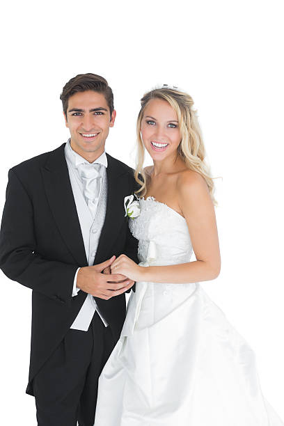istock Happy attractive married couple posing holding hands 511025177