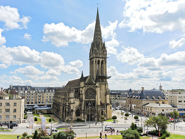 Church of Saint-Pierre in Caen city, France Caen, France - August 5, 2014: people near Church of Saint-Pierre in Caen city, France. Construction of the present building took place between the early 13th and the 16th centuries caen photos stock pictures, royalty-free photos & images