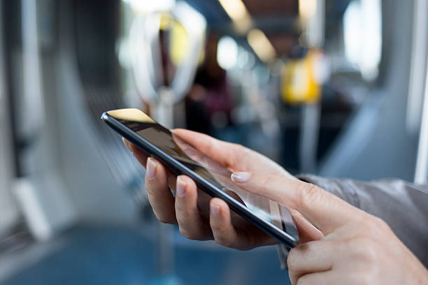 istock Female using her smart-phone on subway. Metro. Sms, message 511026800
