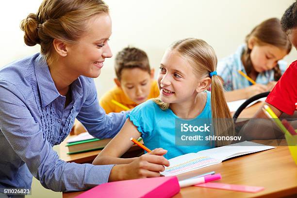 Pupil And Teacher Stock Photo - Download Image Now - Adult, Boys, Child