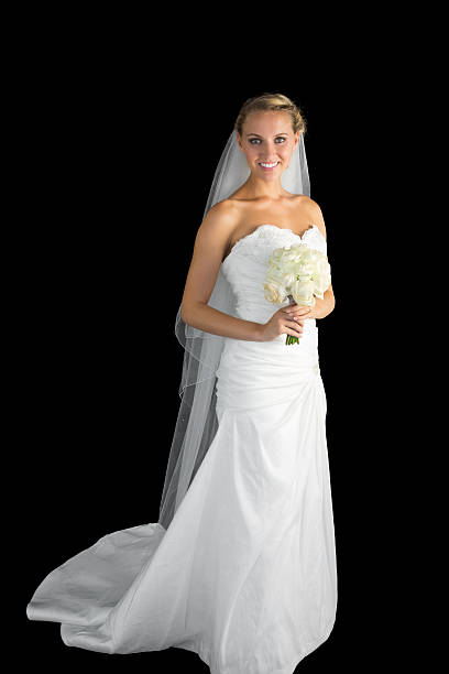 istock Gorgeous young bride posing holding a bouquet 511027543
