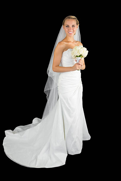 istock Cheerful blonde young bride posing holding a bouquet 511027553