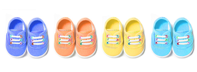 Four pairs of cute canvas baby shoes.