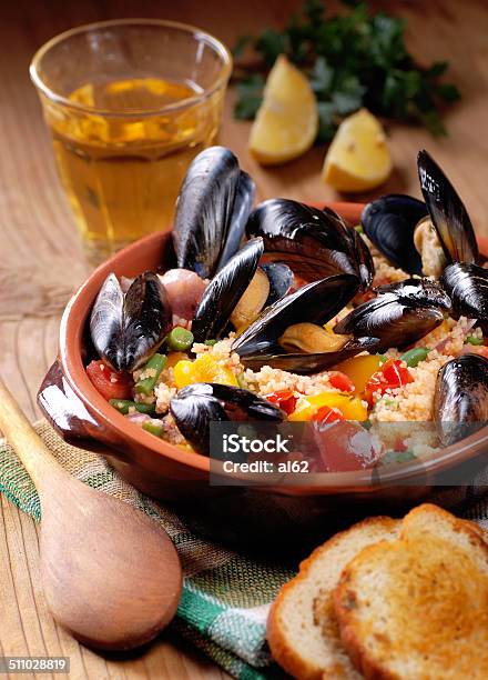 Couscous With Mussels In Earthenware Bowl Stock Photo - Download Image Now - Appetizer, Close-up, Couscous