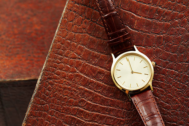istock Luxury men's watch on leather, close up 511028823