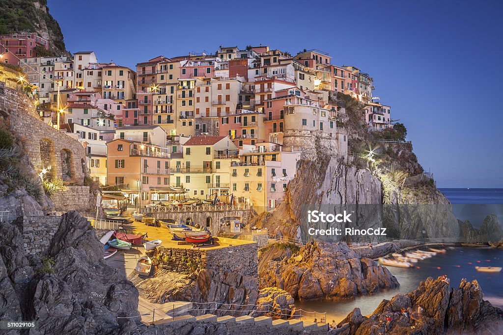 Village Of Manarola By Night Village of Manarola by night. Liguria, Italy Architecture Stock Photo