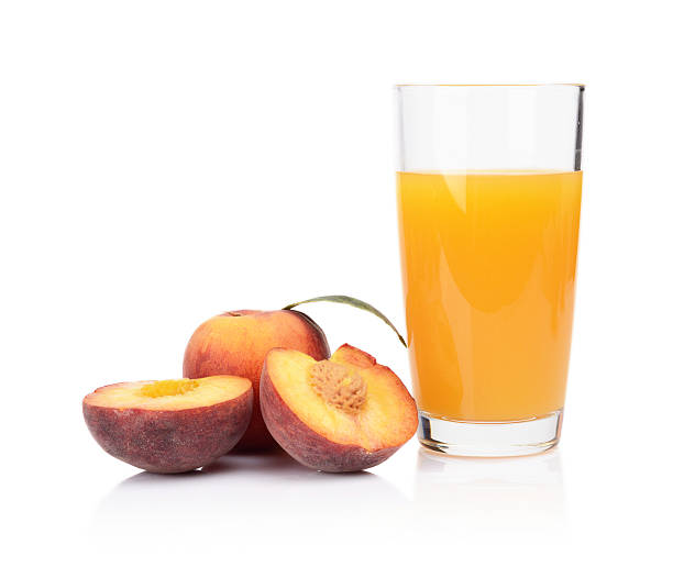 istock Close-up shot sliced orange peaches with juice 511029295