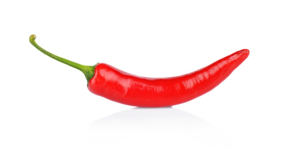 Studio shot of red pepper, chilli isolated on a white background