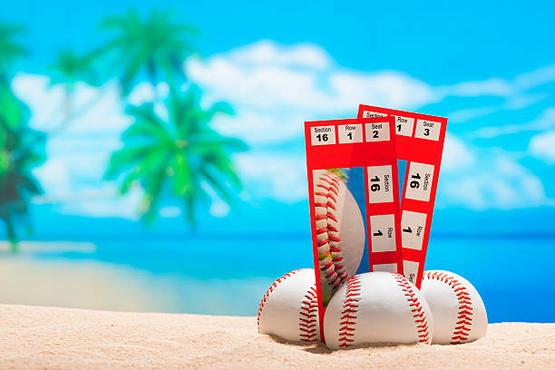 istock Two baseball tickets stubs on the beach for Spring Training 511029526