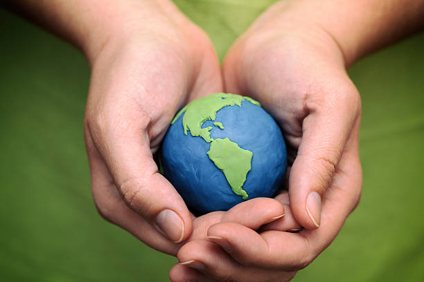 istock Planet Earth in the woman's hands 511029691