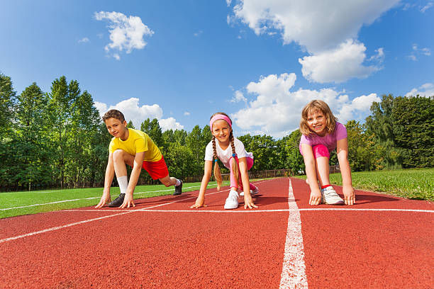 istock Smiling children in ready position to run 511029789