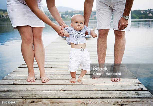 Family Feet On Pier Stock Photo - Download Image Now - Adult, Baby - Human Age, Barefoot