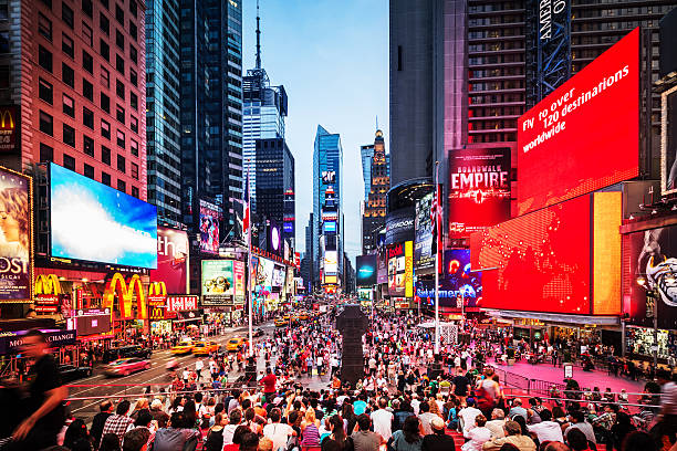 Times Square New York City Crowded Times Square at Twilight in New York City, USA. stage theater photos stock pictures, royalty-free photos & images