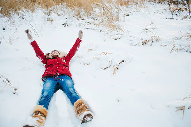 istock Winter nice girl holding a red heart 511032270