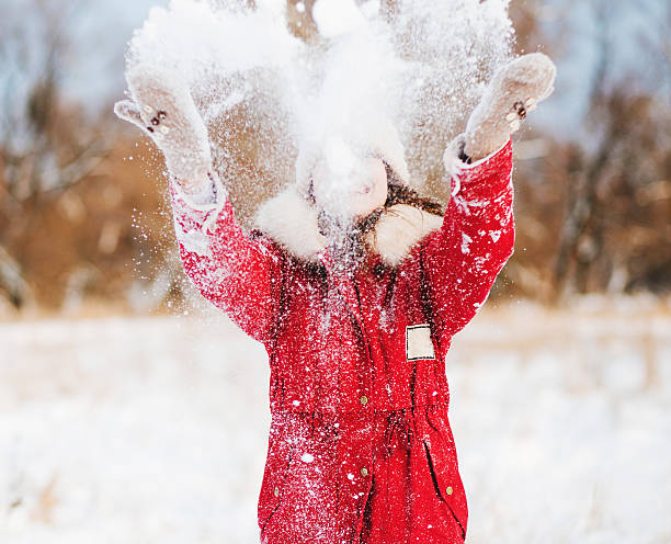 istock Winter nice girl holding a red heart 511050956