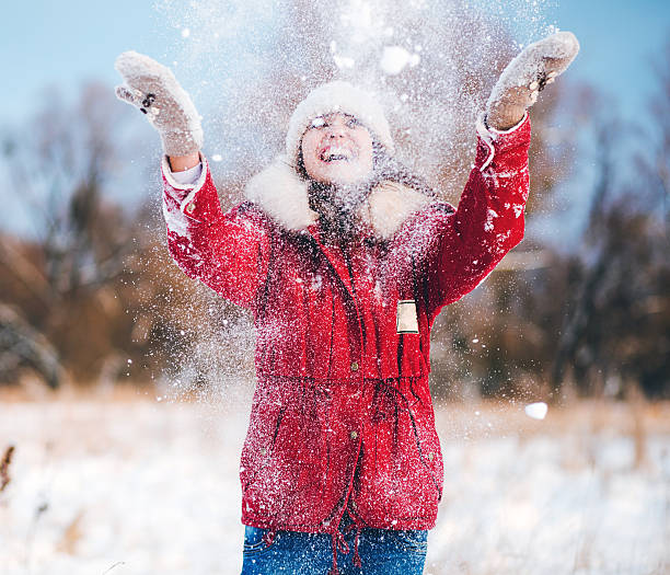 istock Winter nice girl holding a red heart 511051252
