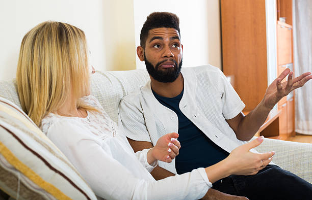 istock Happy young people sitting indoors and talking 511053078
