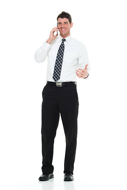 istock Smiling businessman talking on phone 511053590