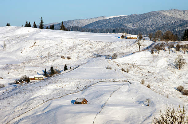 istock Carpathian mountain valley covered with fresh snow. Majestic lan 511053690