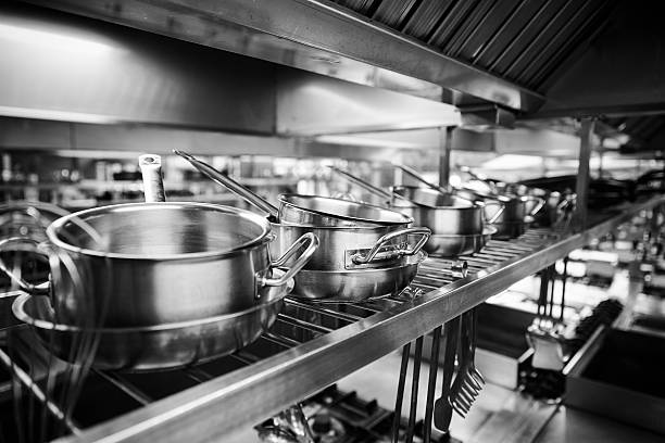 Industrial Kitchen - Pots and tools on shelves