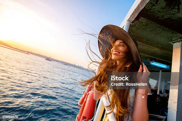 Woman Enjoying The Sea From Ferry Boat Stock Photo - Download Image Now - Tourist, Travel, Women