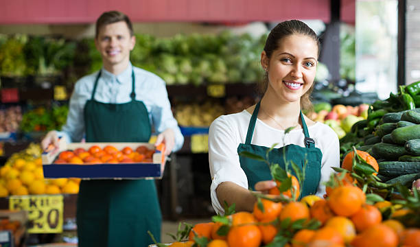 istock Stuff in apron selling sweet oranges, lemons and tangerines 511054536