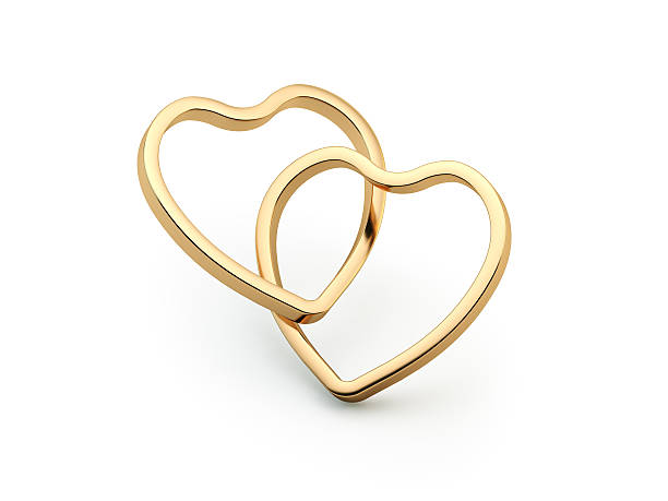 istock Two Golden Hearts United on White Background 511054980
