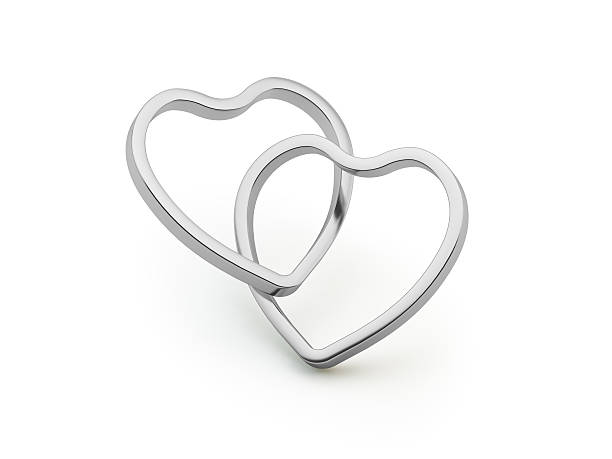 istock Two White Gold Hearts United on White Background 511054994