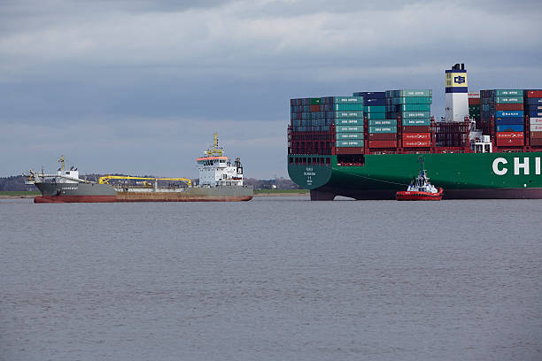 Steinkirchen, Germany - February 7, 2016: The container vessel CSCL Indian Ocean lying on ground of the river Elbe since February 3, 2016 at Steinkirchen (near Stade, Lower Saxony, Germany) on February 7, 2016.