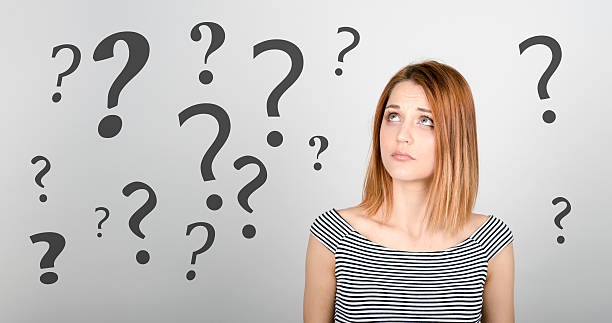 istock Girl looking up pensively 511058406