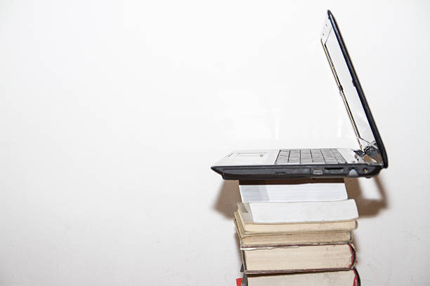 istock Laptop and books 511058630