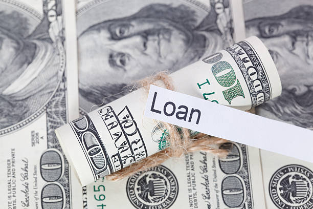 istock The dollar bills with a sign - Loan 511059278