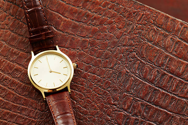 istock Luxury men's watch on leather, close up 511059365