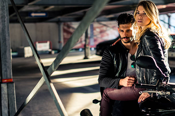 istock Stylish couple on a motorcycle 511059398