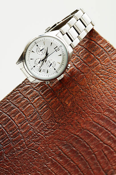istock Luxury men's watch on leather, close up 511059527