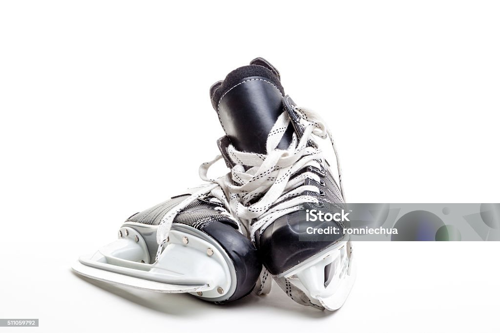 Par de patins de hóquei no gelo - Foto de stock de Patim de Gelo royalty-free