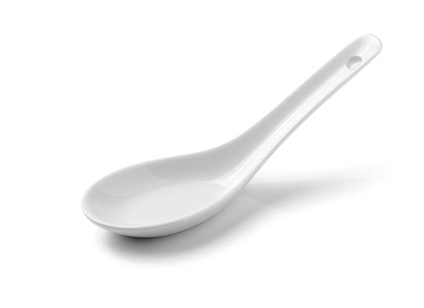 istock White Chinese soup spoon isolated on white background 511059805